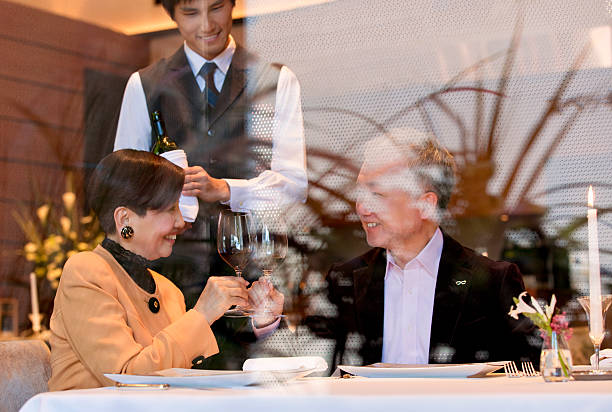 Happy mature couple dining at a restaurant