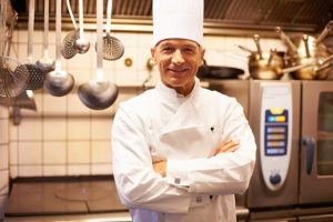 Portrait of confident chef smiling